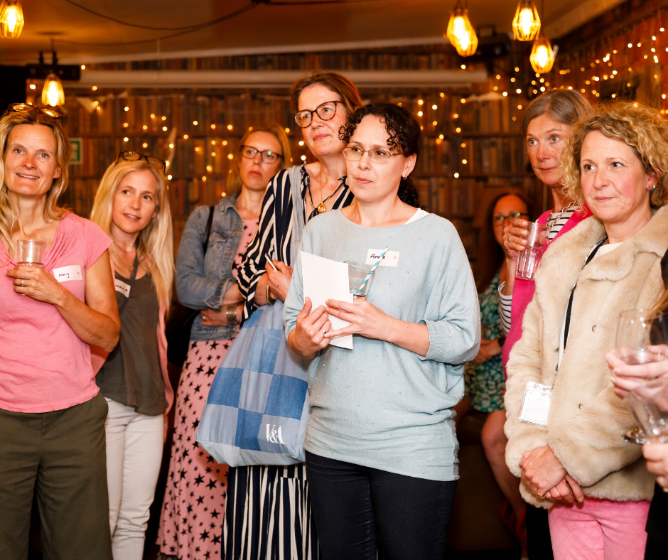 women intently listening to a speaker